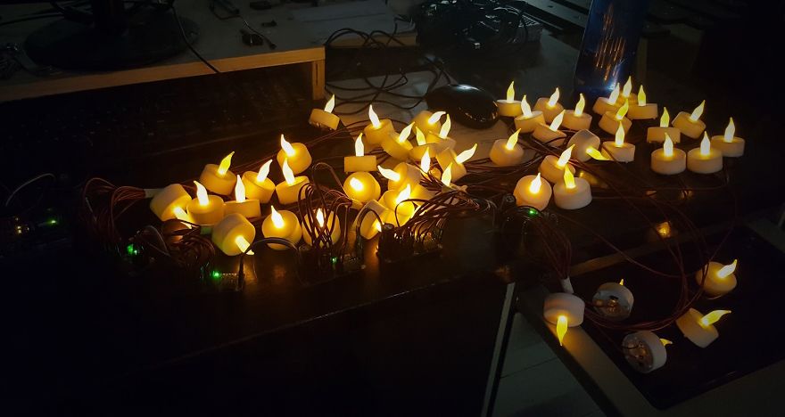 We Made An Interactive Installation That Shows Your Reflection Using Hundreds Of Votive Candles We Made An Interactive Installation That Shows Your Reflection Using Hundreds Of Votive Candles