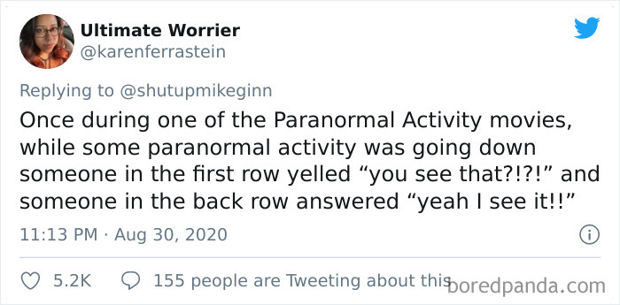 Tweet showing a bizarre thing overheard in a movie theater during Paranormal Activity film conversation.