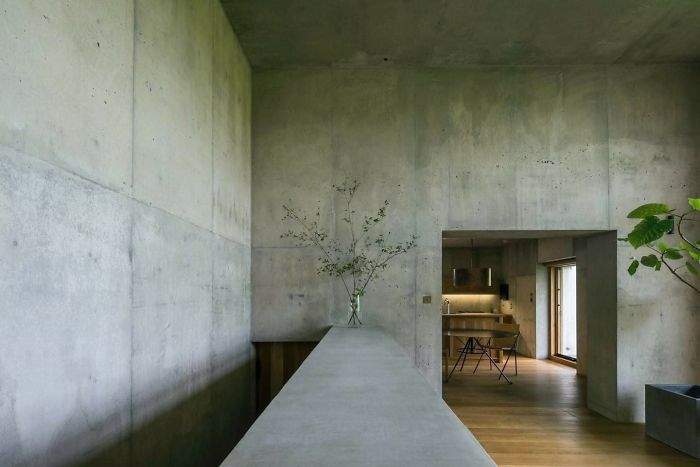 Japanese Architects Build Exposed Concrete House With A Delicate And Warm Interior Japanese Architects Build Exposed Concrete House With A Delicate And Warm Interior