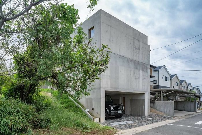 Japanese Architects Build Exposed Concrete House With A Delicate And Warm Interior Japanese Architects Build Exposed Concrete House With A Delicate And Warm Interior