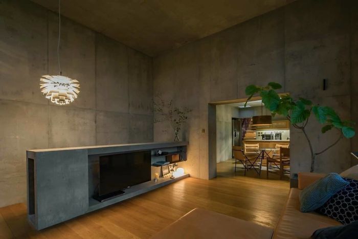 Japanese Architects Build Exposed Concrete House With A Delicate And Warm Interior Japanese Architects Build Exposed Concrete House With A Delicate And Warm Interior