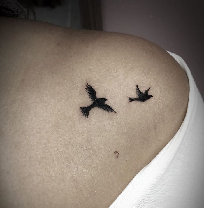 Bird tattoos on shoulder, a commonly requested design among tattoo artists.