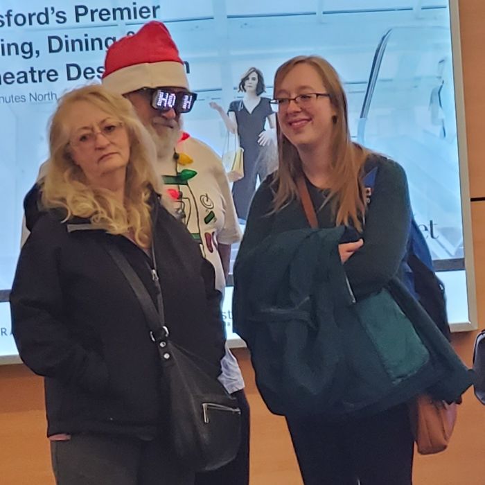 This Legend Picking Someone Up At The Airport, And His Unimpressed-Looking Wife