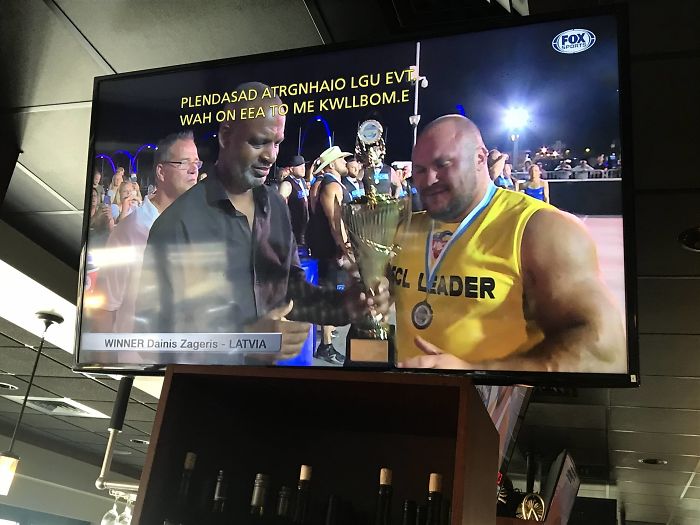 One Of The Many Tvs At The Bar I Tend Frequents Strong Man Competitions. One Day, The Subtitles Decided To Be Extra Cool.
