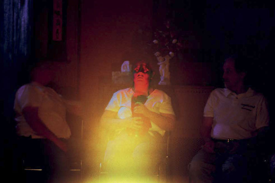 Shannon Taggart “Flashlight Experiment" (Raymond Buckland Seated At Right). Lily Dale, NY, 2003