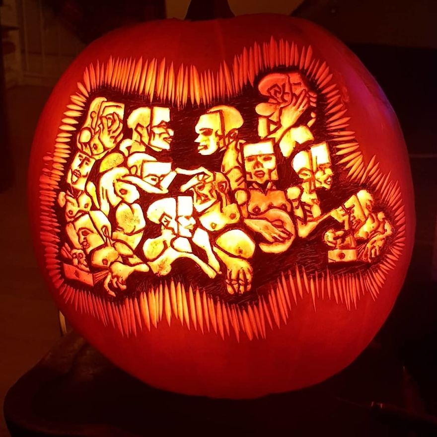 Pumpkin carving depicting horror scene characters, intricately detailed with glowing light.