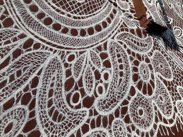 Warsaw-Based Artist Spray-Paints A Beautiful Lace Mural On The Side Of A French Lace Museum Warsaw-Based Artist Spray-Paints A Beautiful Lace Mural On The Side Of A French Lace Museum
