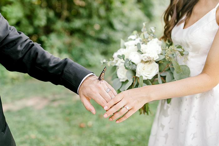 Couple's Wedding Photoshoot Gets A Fairytale-Like Twist After A Monarch Butterfly Joins In