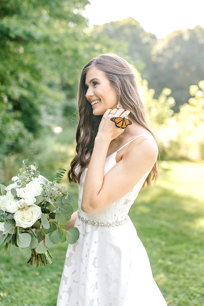 Couple's Wedding Photoshoot Gets A Fairytale-Like Twist After A Monarch Butterfly Joins In
