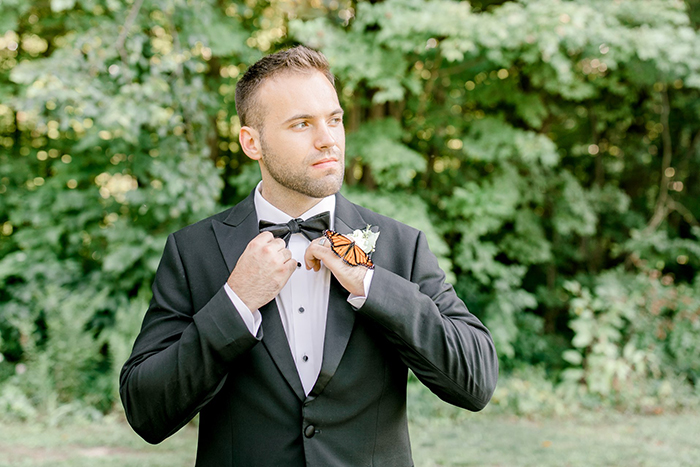 Couple's Wedding Photoshoot Gets A Fairytale-Like Twist After A Monarch Butterfly Joins In