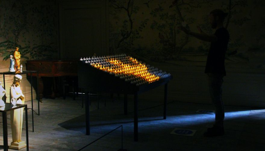 We Made An Interactive Installation That Shows Your Reflection Using Hundreds Of Votive Candles We Made An Interactive Installation That Shows Your Reflection Using Hundreds Of Votive Candles