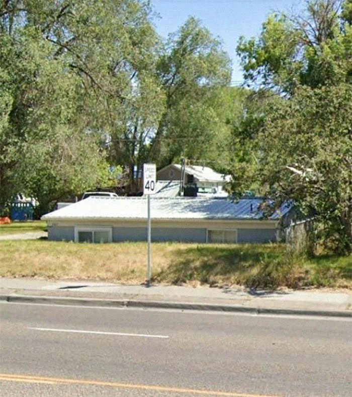 House On My Running Route Partially Sunken Into The Ground
