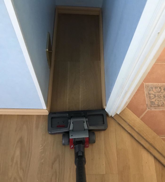 The Way Our Vacuum Cleaner's Head Just Barely Doesn't Fit In This Gap