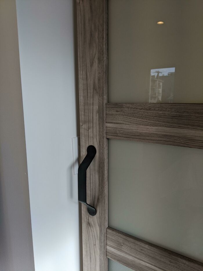 This Door Slides Shut Onto A Light Switch