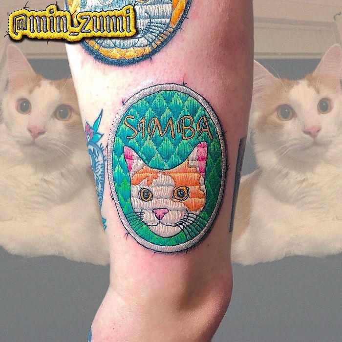 Tattoo of a sewn-on patch featuring a cat named Simba on a person's leg, with cat images in the background.