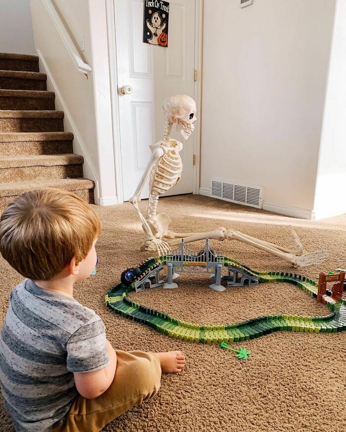 Toddler Befriends A Creepy Skeleton His Parents Got As A Halloween Decoration, Even Has It Watch Over Him As He Sleeps
