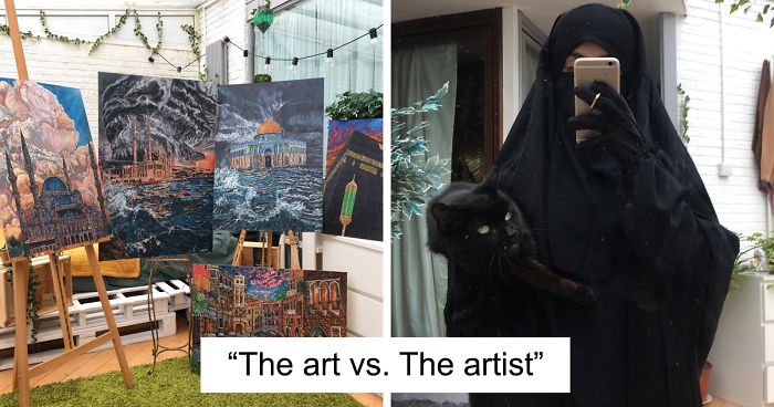 A collection of paintings displayed on easels and a person dressed in black holding a black cat for art vs artist challenge responses.