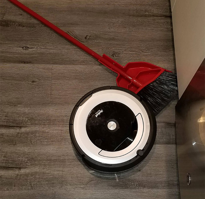Came Home To A Murder. I Think My Broom Resents My New Purchase. The Roomba's Battery Died Like This