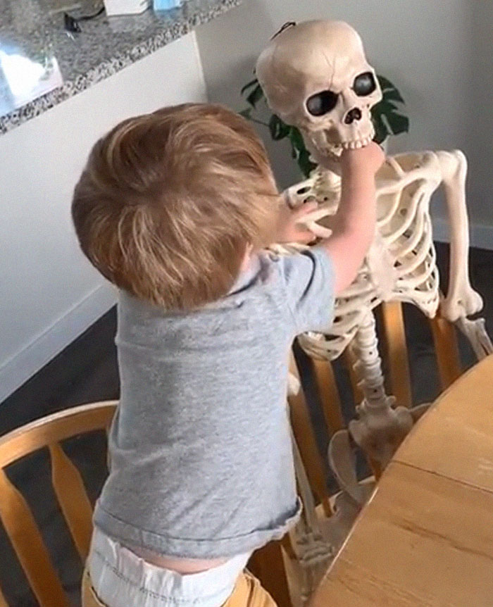 Toddler Befriends A Creepy Skeleton His Parents Got As A Halloween Decoration, Even Has It Watch Over Him As He Sleeps