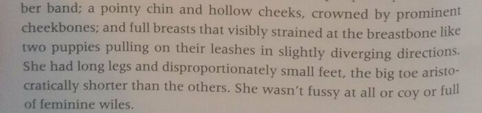 Book page with a paragraph describing woman breast