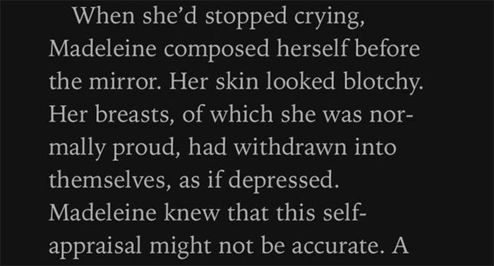Book page with a paragraph describing woman looking at herself in the mirror 