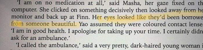 Book page with a paragraph describing woman eyes 