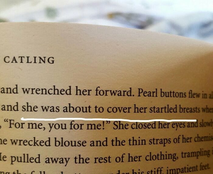 Book page with a paragraph describing woman breast 