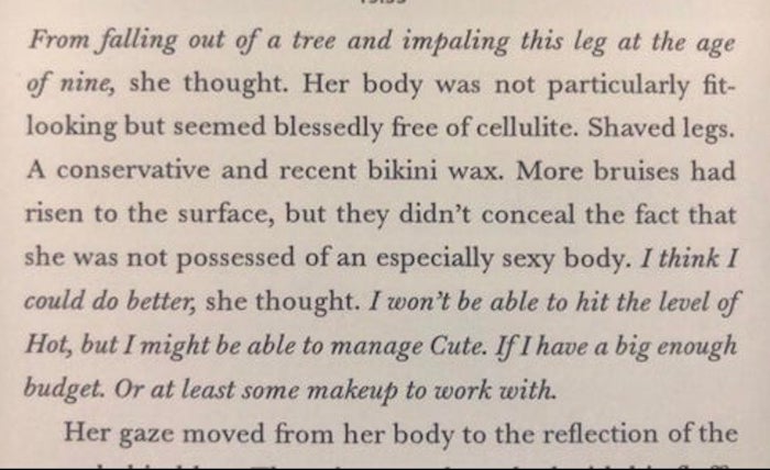 Book page with a paragraph describing woman body 