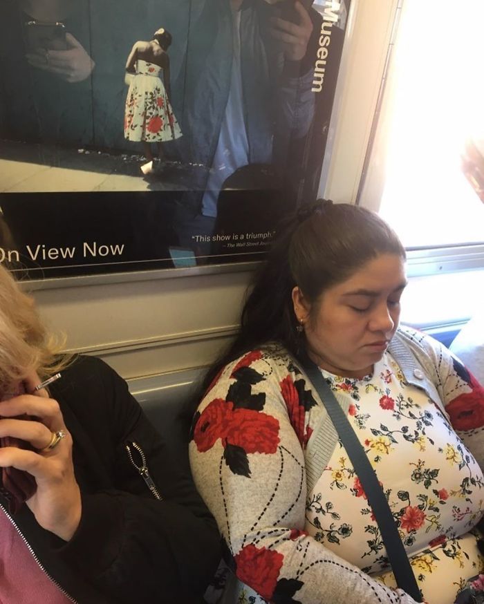 People Sitting Under Signs That Resemble Them