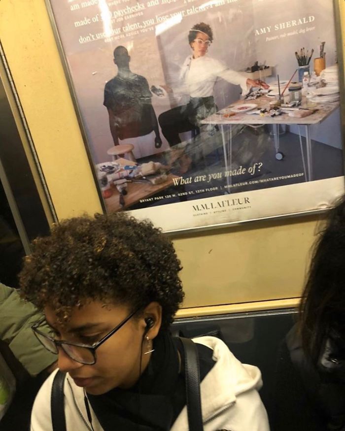 People Sitting Under Signs That Resemble Them