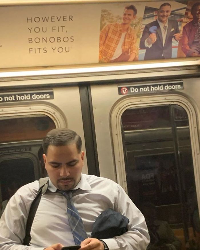 People Sitting Under Signs That Resemble Them