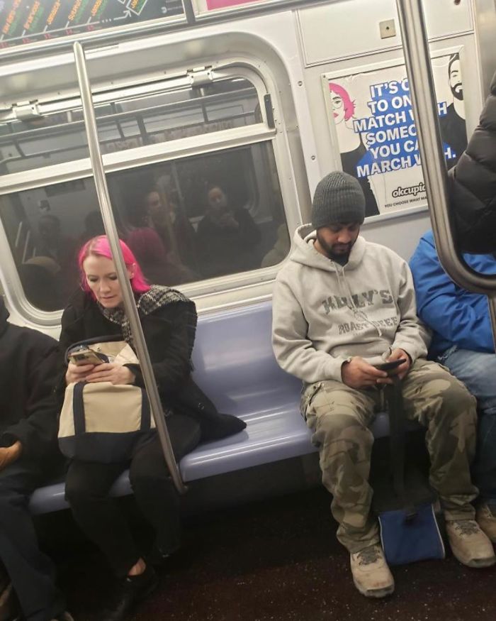 People Sitting Under Signs That Resemble Them