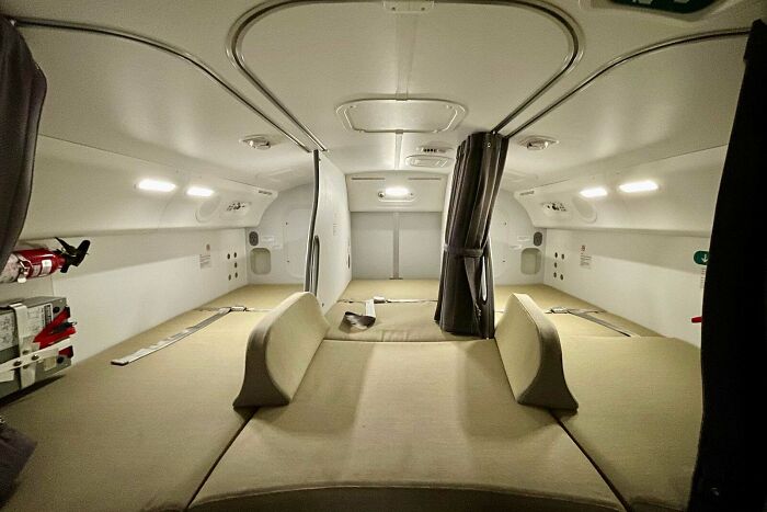 Here's What It's Like Inside Your Plane's Hidden "Crew Rest," Where Pilots And Flight Attendants Sleep