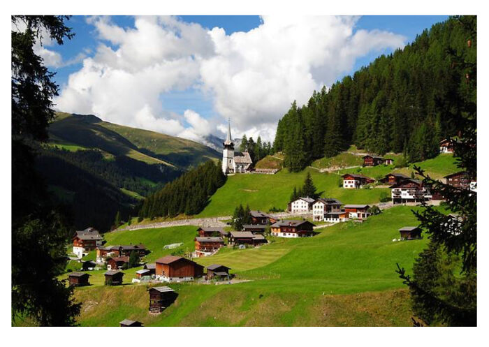 Monstein, Switzerland 10 Kilometers Up The Mountain From Davis In The Alps. You Can Sled For Several Km Down The One Lane Snow Covered Road In Winter.