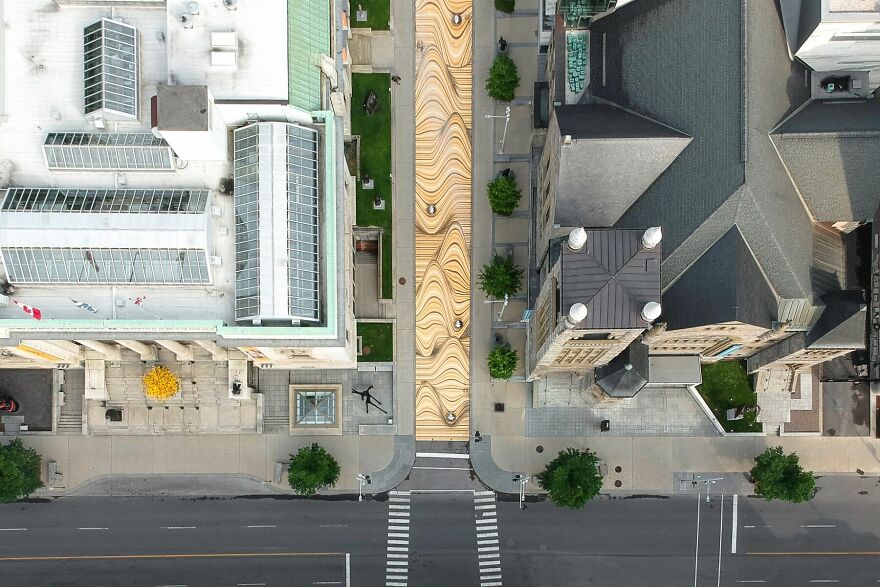 Optical Illusion Transforms A Street In Montreal Into Wavy Sand Dunes