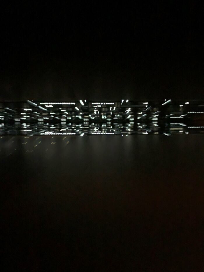 My Almost Closed Computer Lid Looks Like A Futuristic City At Night