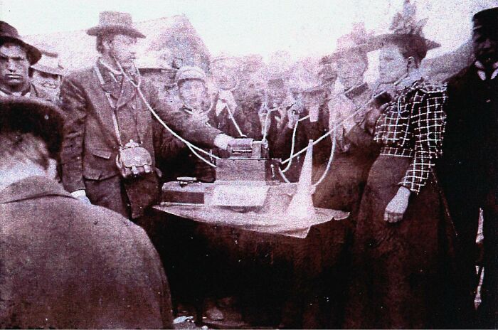 People Wearing Earbuds Listening To A Phonograph With For The First Time During A Cattle Show In Tonstad, Norway, C. 1890's