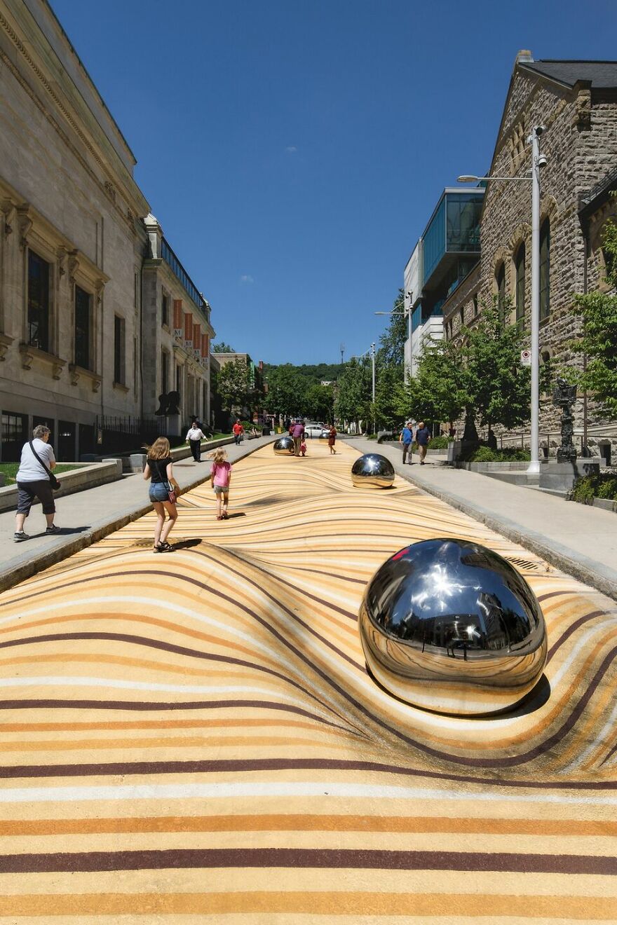 Optical Illusion Transforms A Street In Montreal Into Wavy Sand Dunes Optical Illusion Transforms A Street In Montreal Into Wavy Sand Dunes