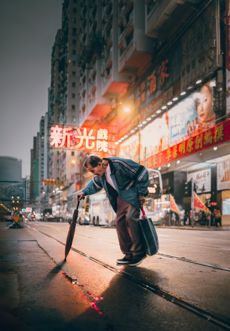 The Bright City Lights Shone Down On Him Like A Spotlight