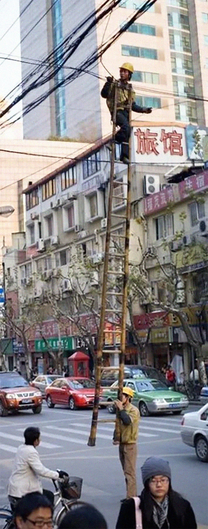How To Hold A Ladder In China