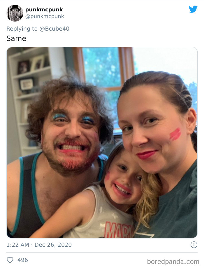 Dad with messy makeup, smiling with daughter and mom after a fun visit to their beauty salon at home.