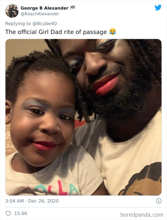 Dad and daughter selfie showing playful makeup after a visit to their daughters' beauty salons at home.