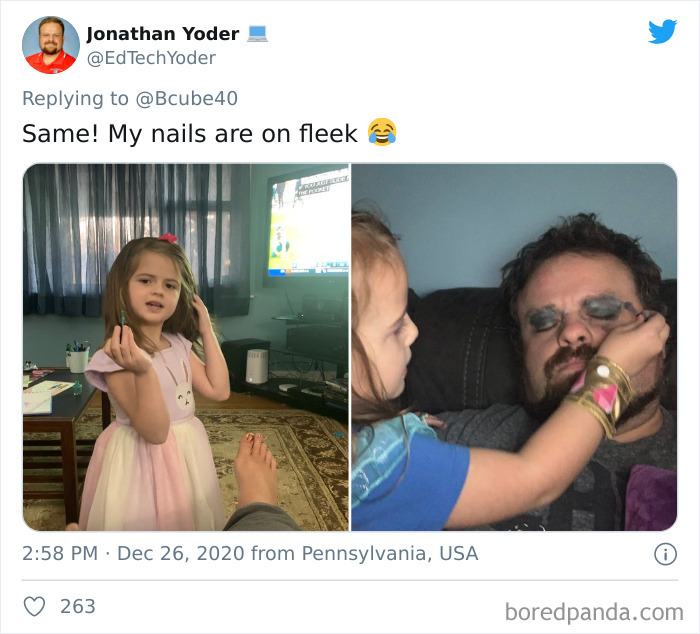 Dad with makeup on his face and daughter showing off her painted nails after a visit to daughters beauty salons.