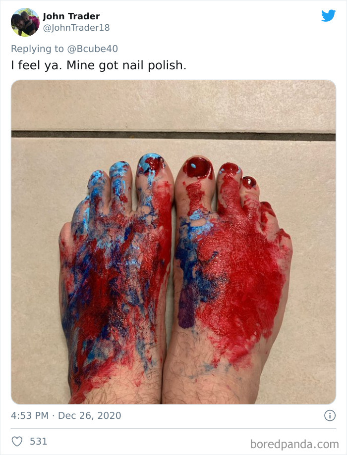 Feet covered in messy red and blue nail polish after a visit to daughters' beauty salons, showing dads' funny reactions.