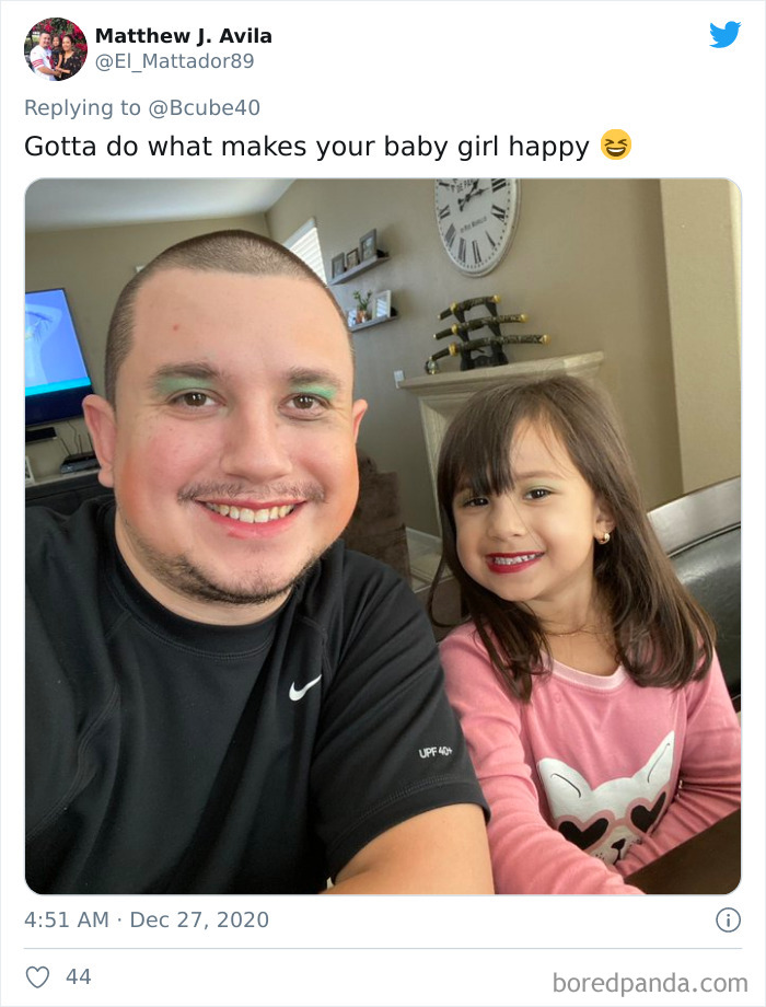 Dad and daughter smiling after a fun visit to her beauty salon, both wearing makeup and sharing a happy moment.