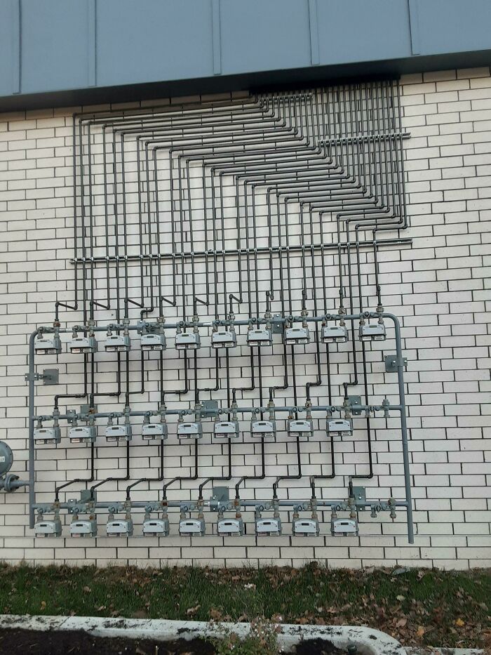 The Uniformity In The Way This Black Pipe Is Ran.