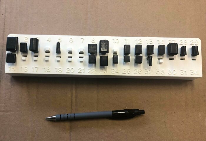 Found In A Storage Cupboard At Work. The Black Bits Come Out. The Number Order Is ... Weird?