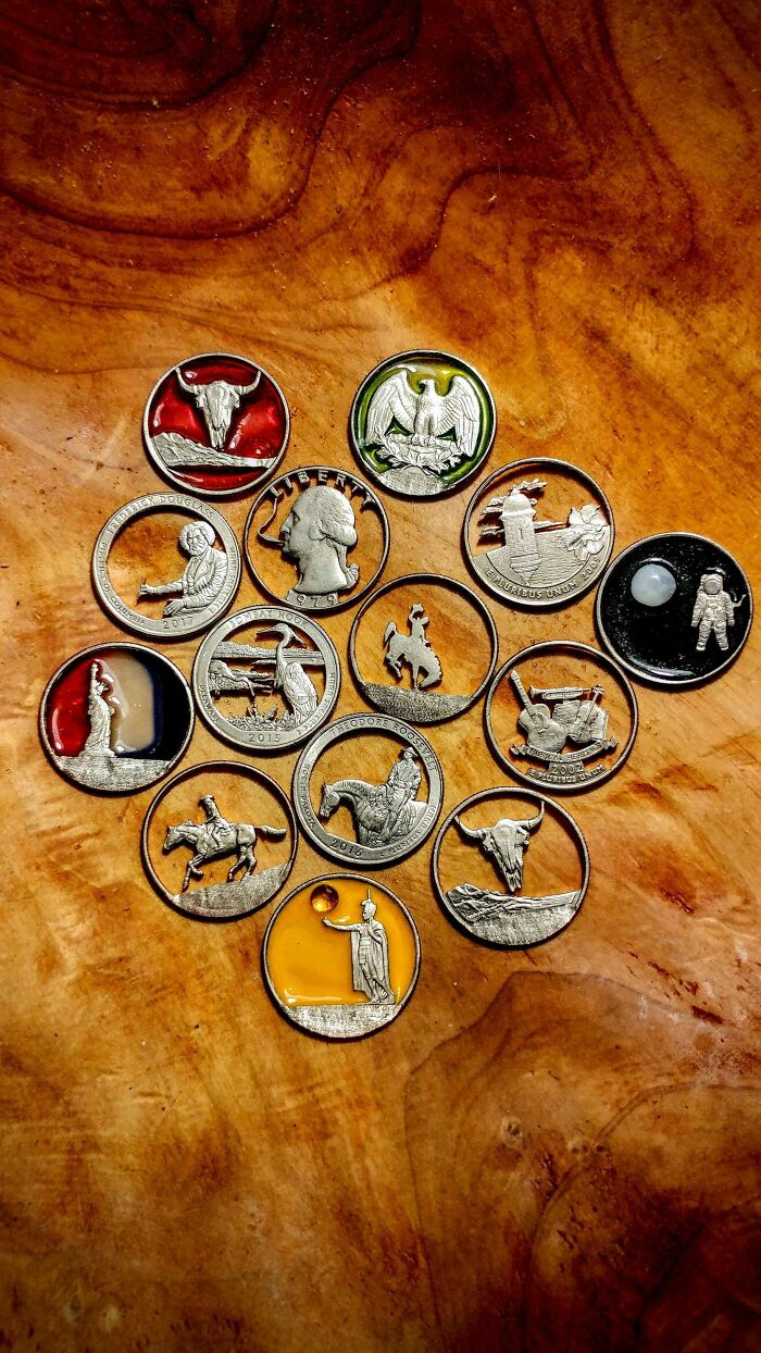 Multiple Piercing State Quarters on a desk 