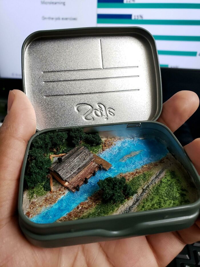 Miniature in a metal can 