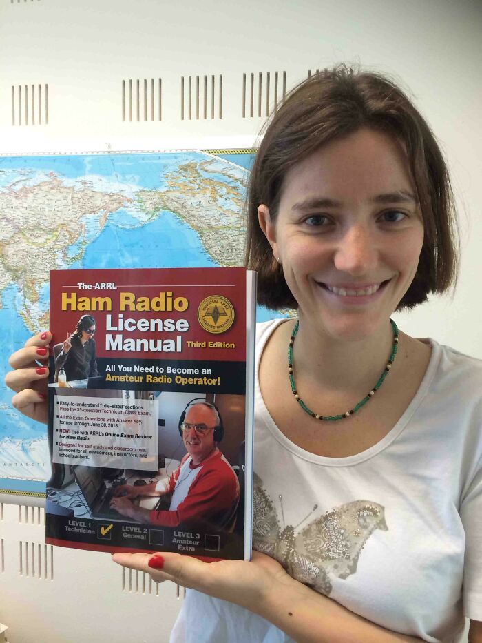 Woman holding a journal 